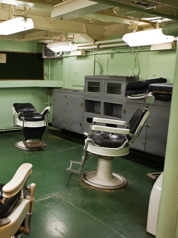 A plain two-chair barber room