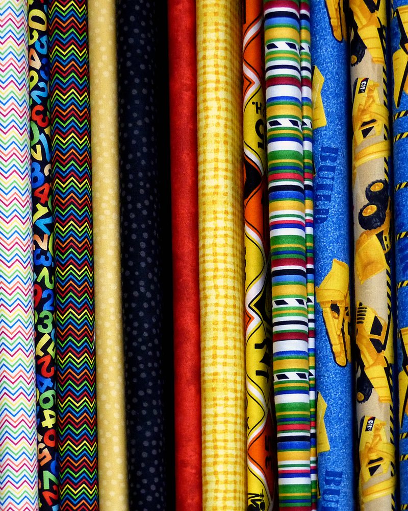 Bolts of cloth in the atelier