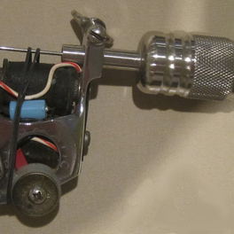 Studio detail: a rollomatic liner machine with its frame and springs in full view.