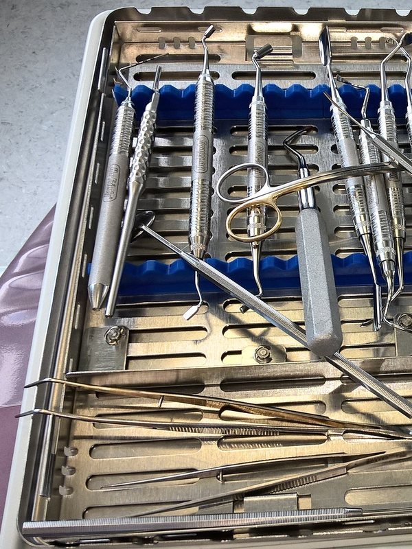 A sterilisation tray of dental instruments