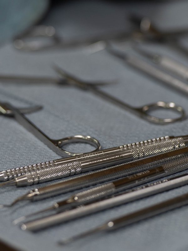 Sterile dental instruments laid out on a drape