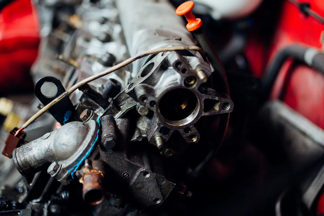 Engine components exposed in an open engine bay during diagnosis