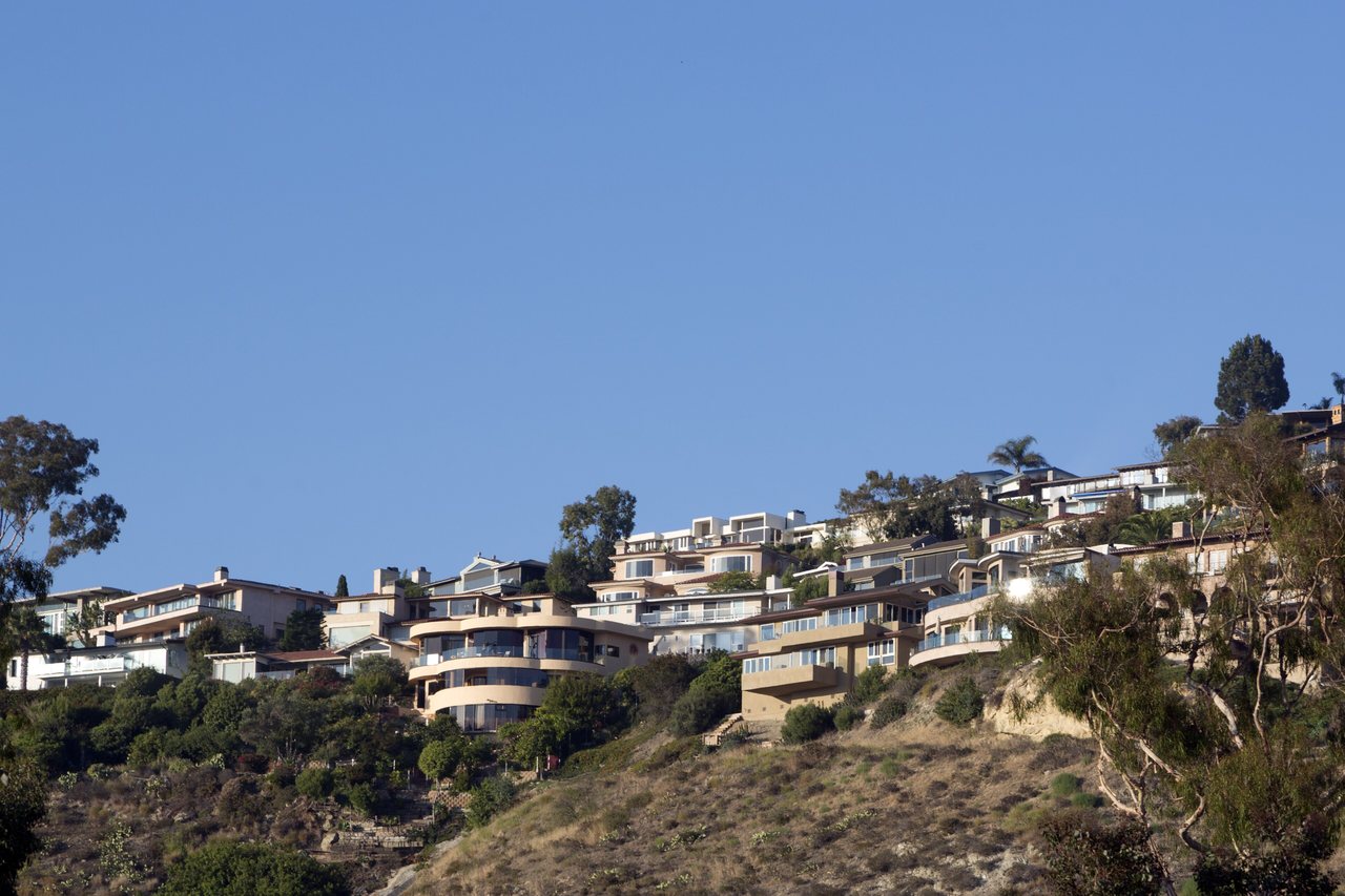 Hillside homes above the beach in a coastal town