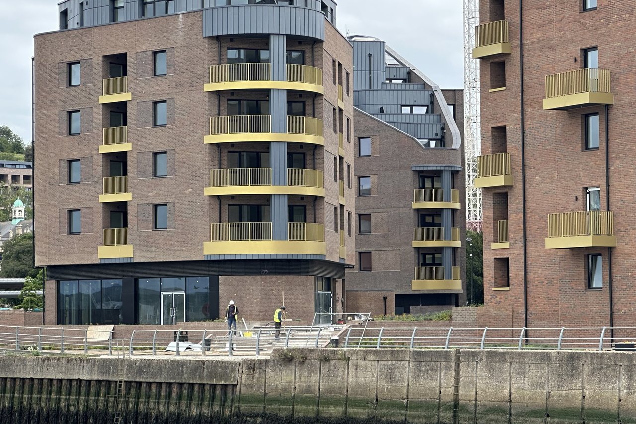 Windward Loft — modern waterfront apartment building on the quayside