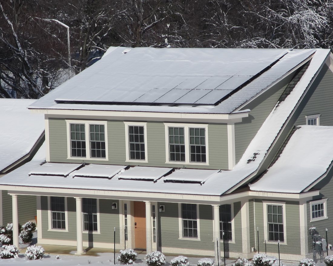 A net-zero family home with a full roof solar array