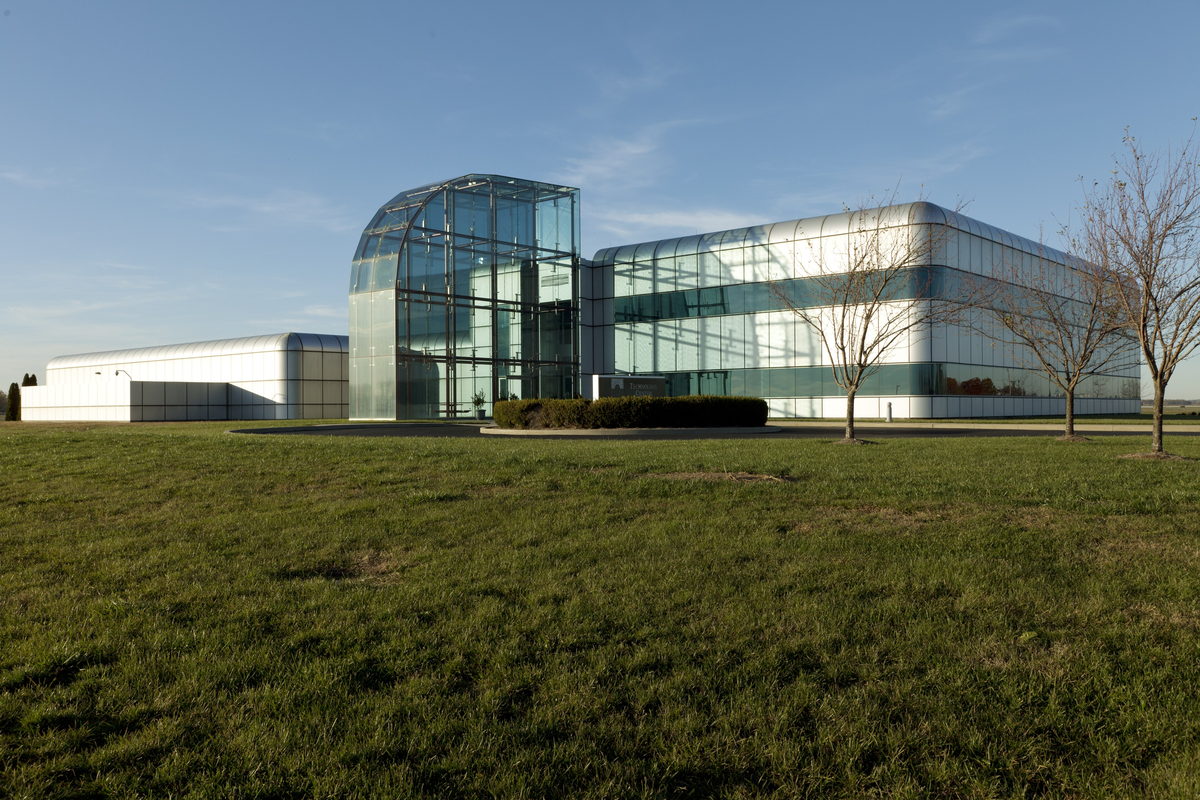 Modern low-rise office building with a glass curtain wall