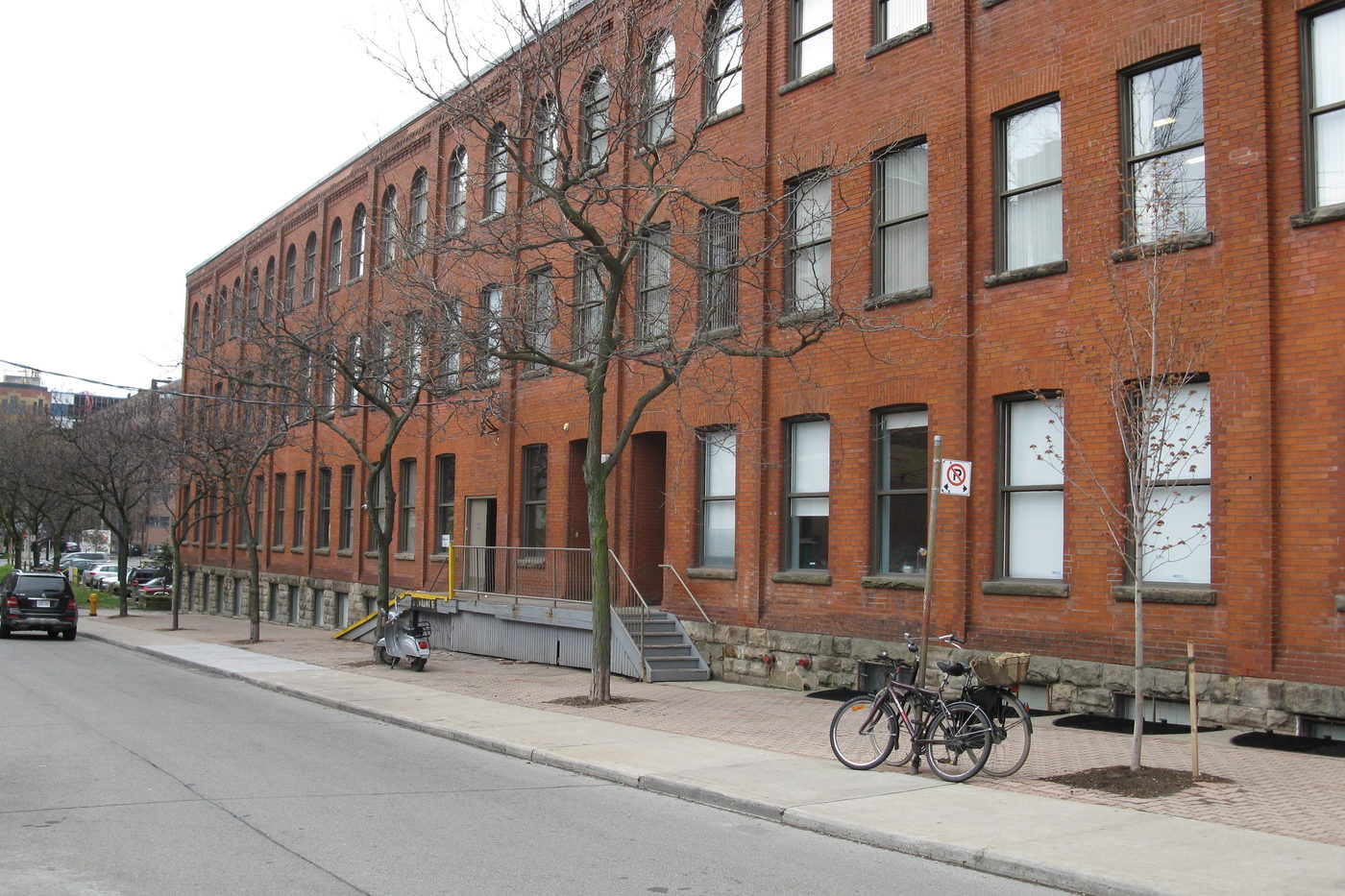 Large old brick loft building on a city block