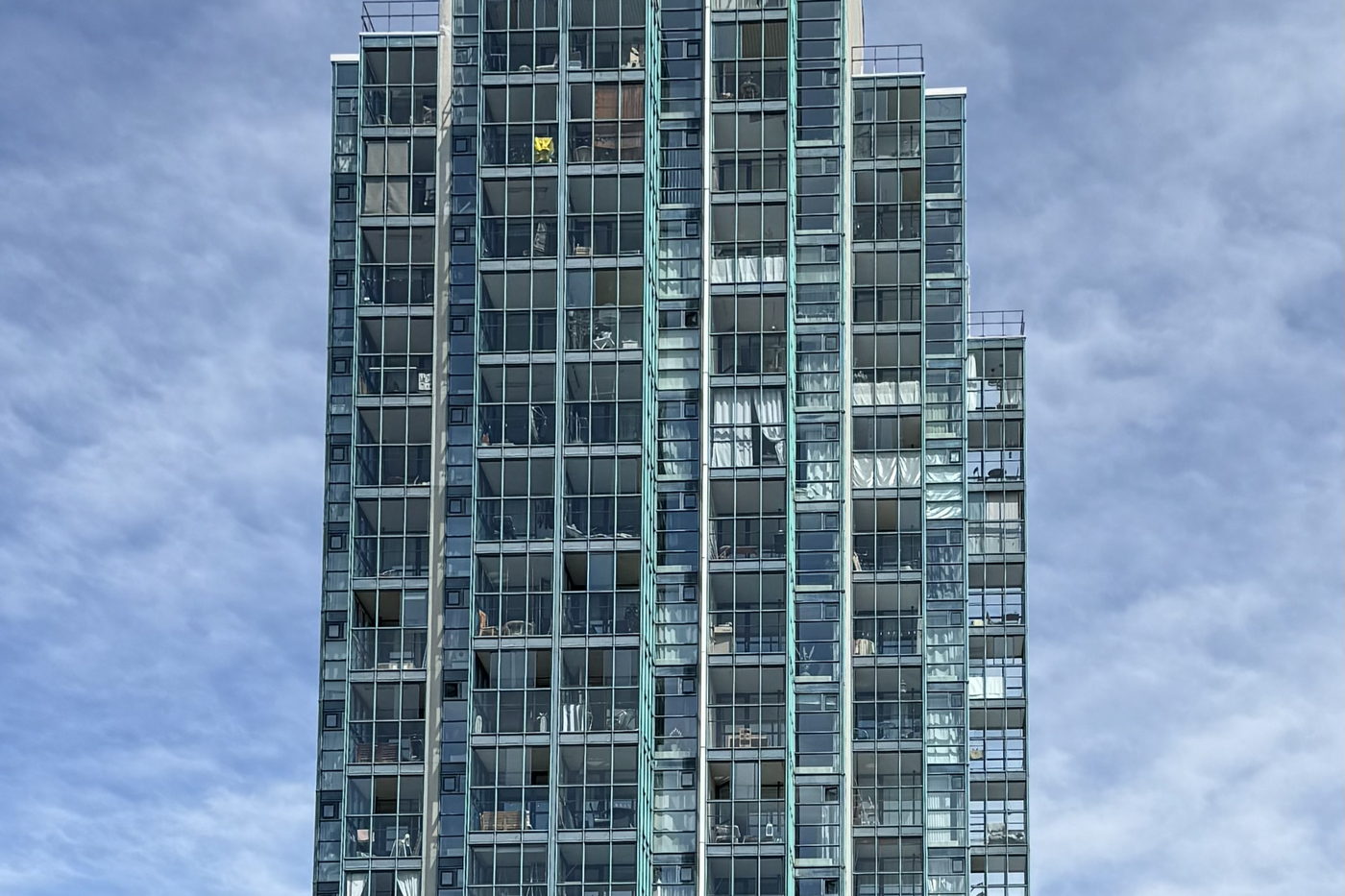 Mid-rise apartment block with stacked balconies