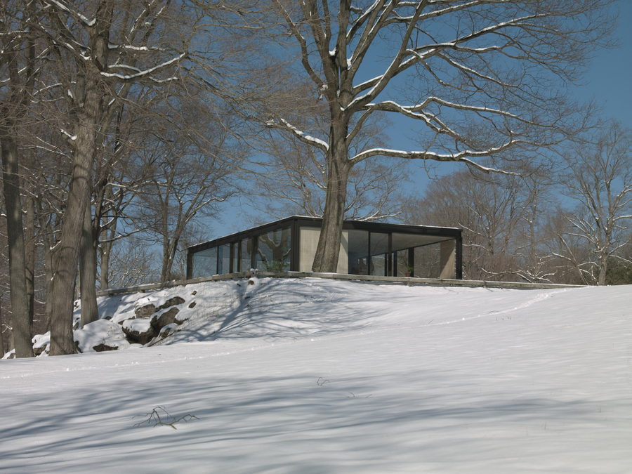 Glass house standing in open lawn