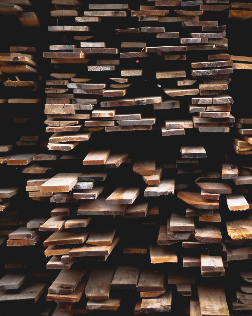 A vertical view of stacked construction lumber.