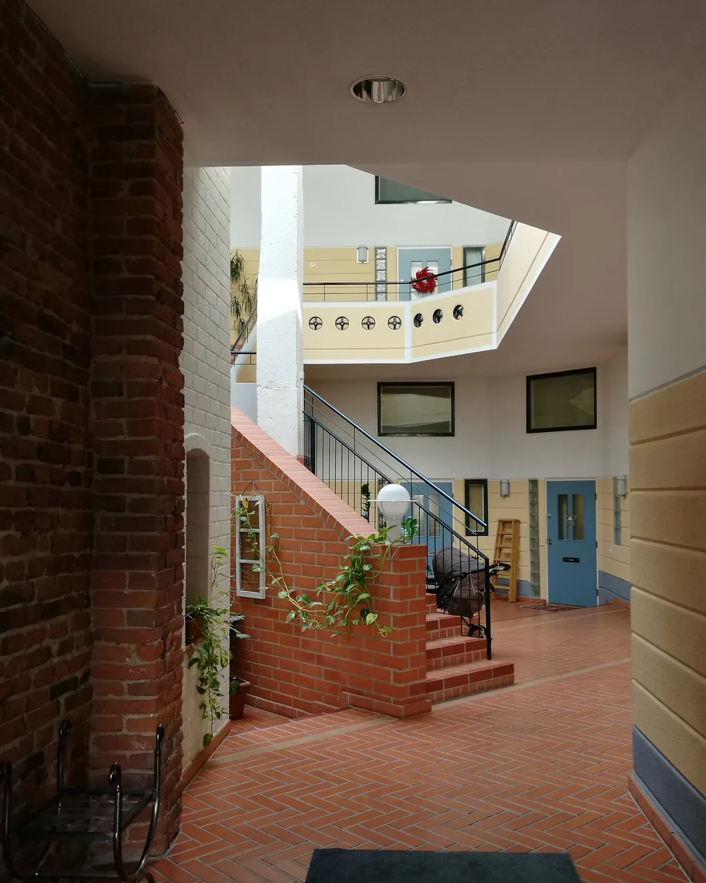 A vertical view of the stairs and doorways on an access route