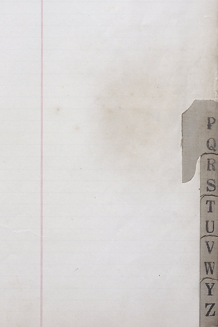The edge of a ruled ledger page with a stepped alphabetical index tab running from P to Z down the right side.