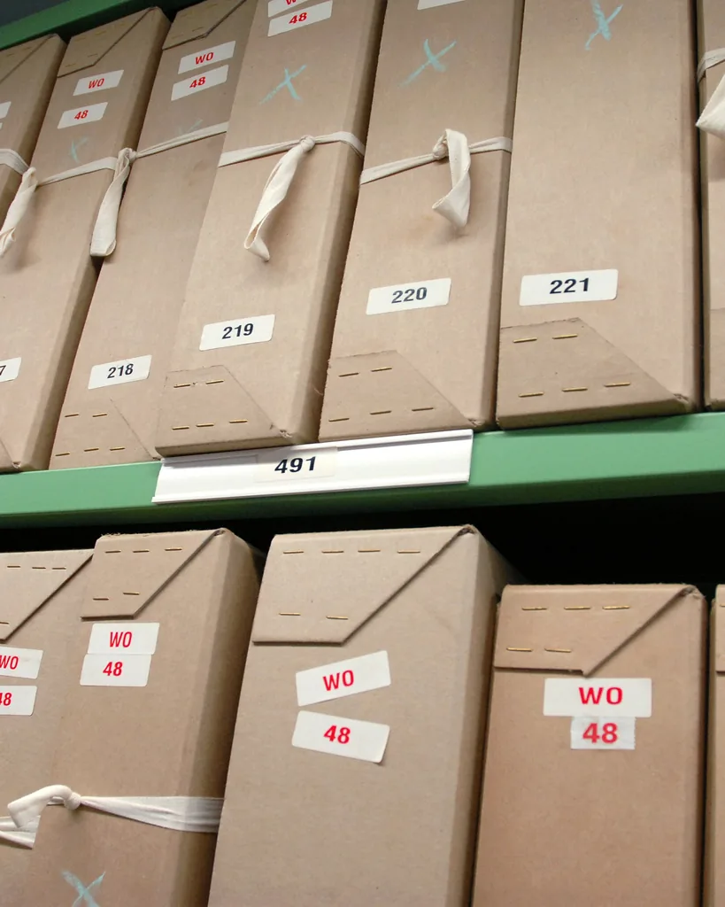 Numbered records boxes shelved in a document store