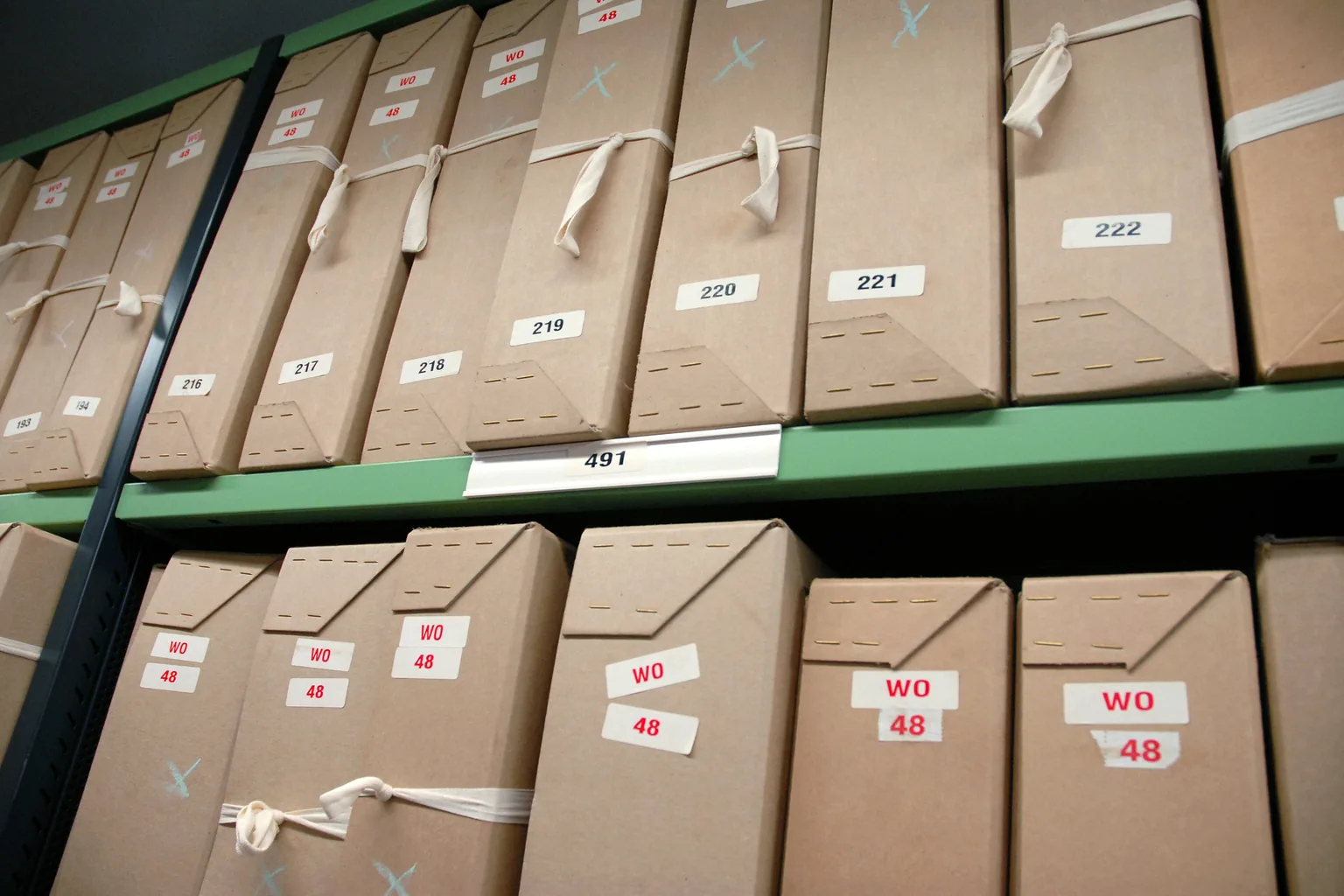 Numbered records boxes shelved in a document store