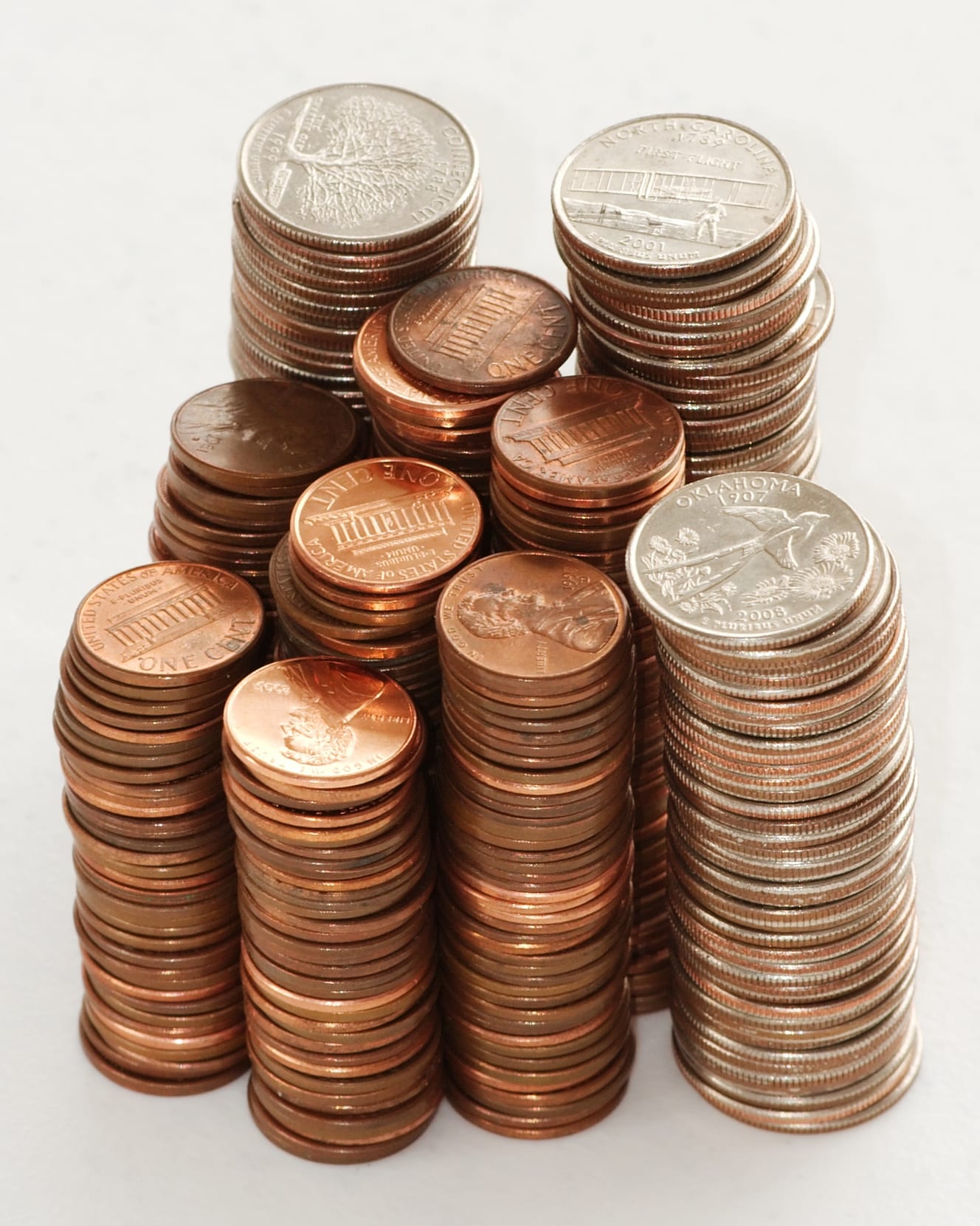 A tall stack of coins photographed close up.