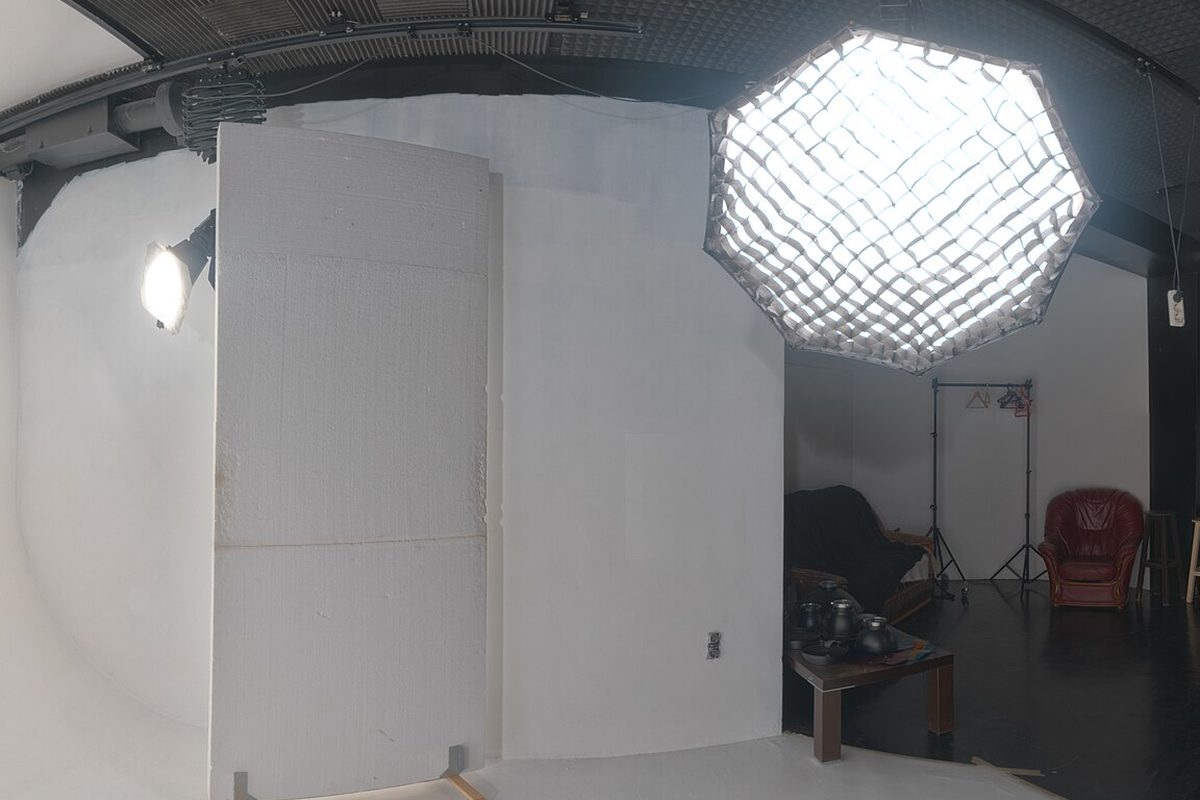 White cyclorama and gridded octabox set up for a portrait sitting