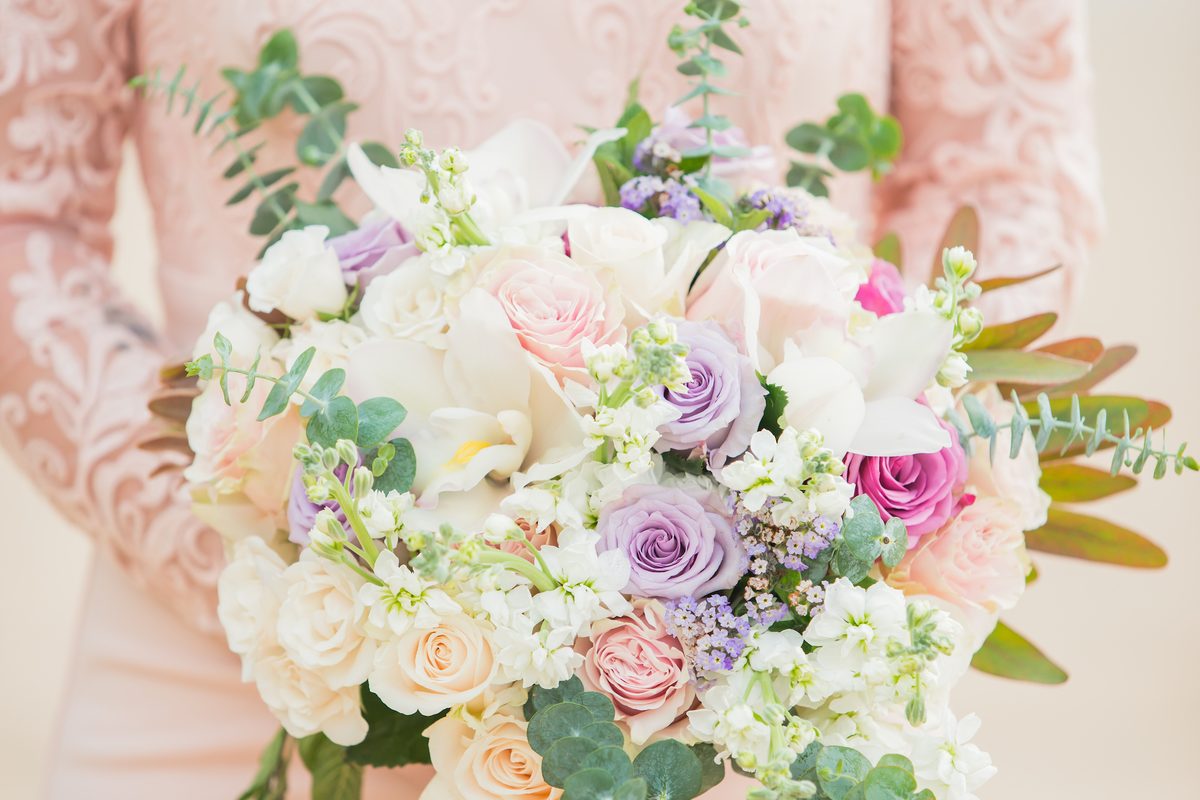 Bridal bouquet of pale roses and eucalyptus on the morning of the wedding