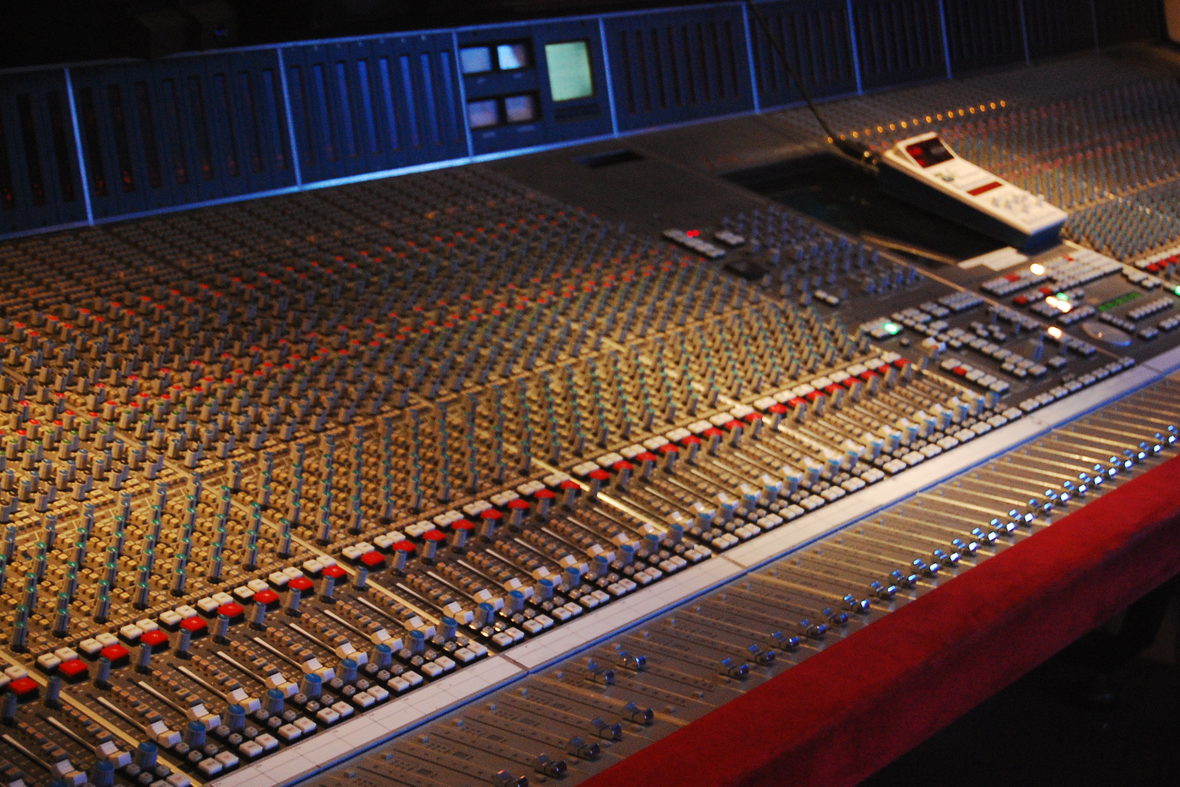A large analogue console photographed along its rows of faders and switches.
